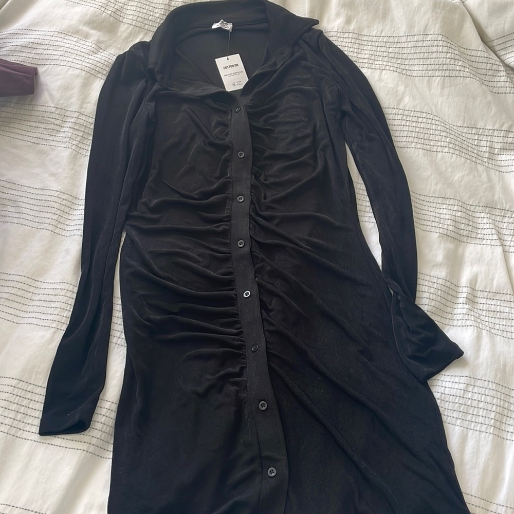 Never worn new with tags scrunched black dress
